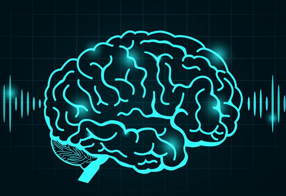 digital picture of brain in green/blue emitting waves